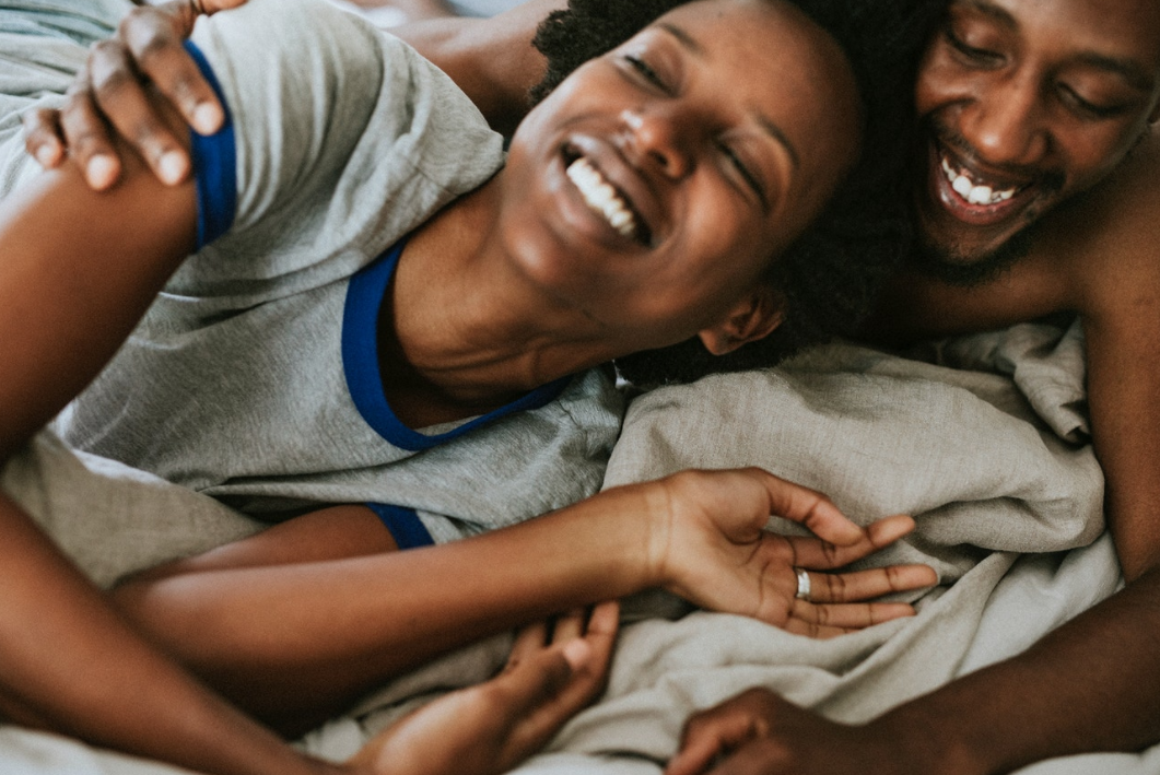 Couple laughing (Photo courtesy of rawpixel.com)