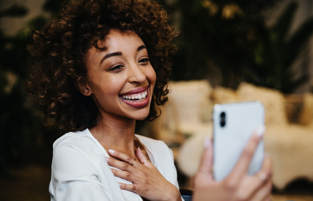 Woman on phone (Courtesy of rawpixel.com)