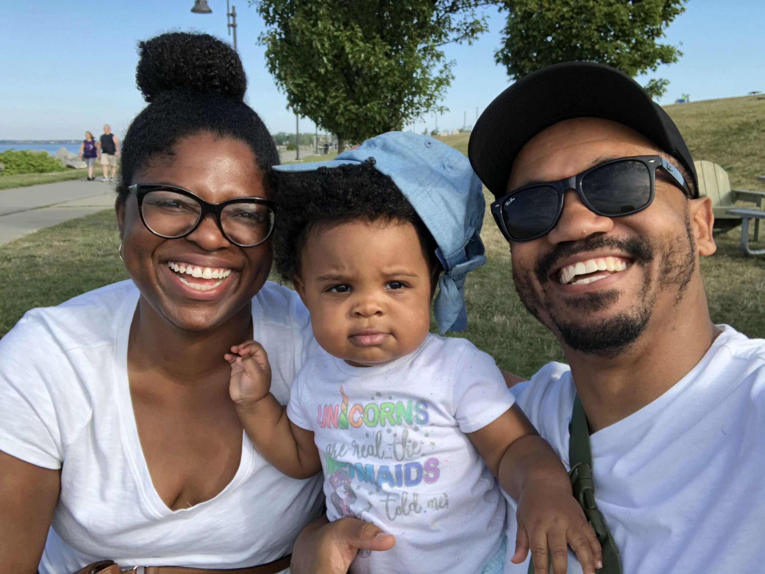 Assistant professor of sociology Cameron Herman with his family