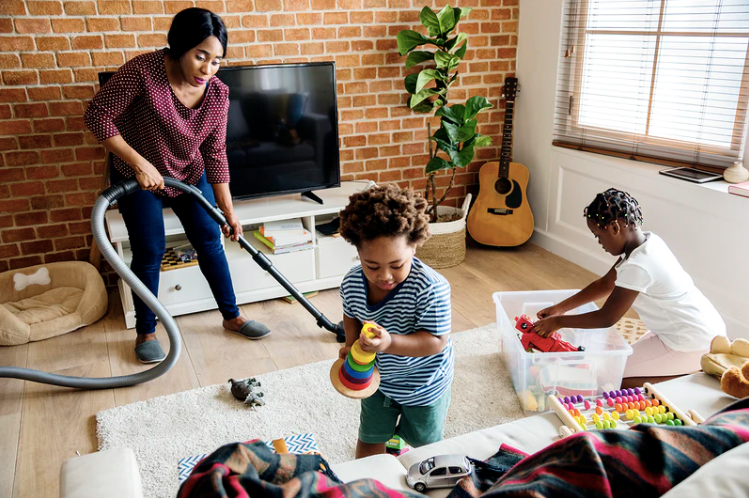 Mom with her children cleaning
