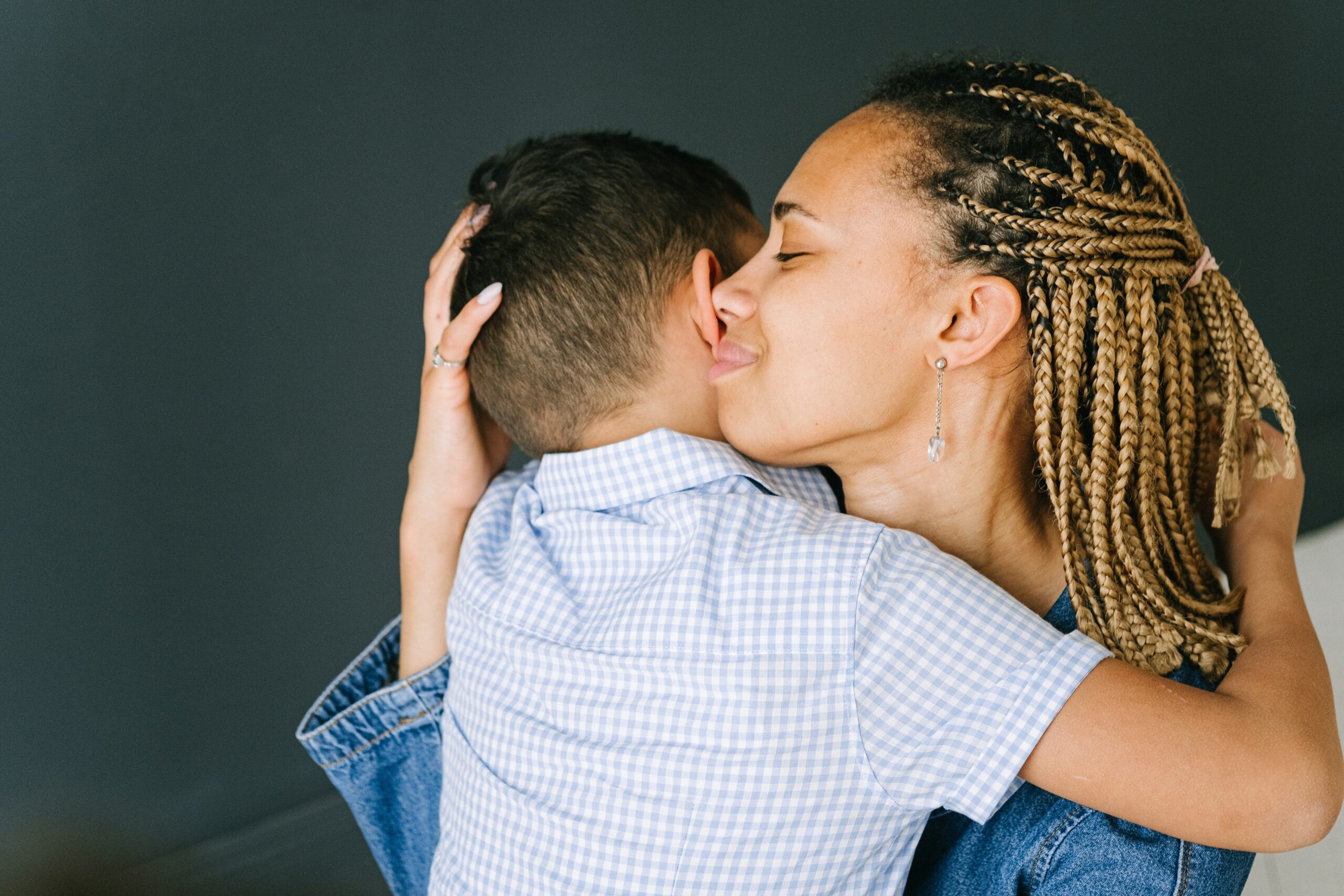 Mom hugging her son