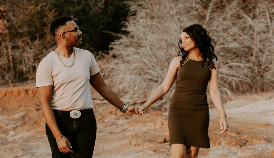 couple walking and holding hands