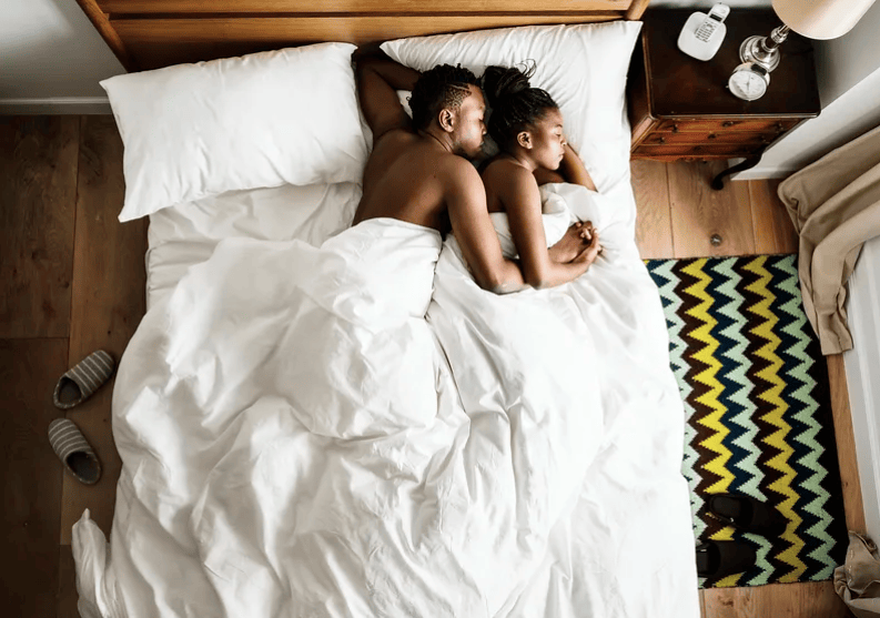 couple sleeping in bed